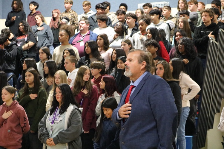 students doing the pledge