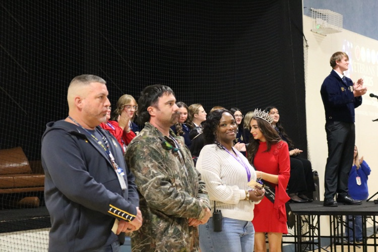 veterans being honored in veterans program