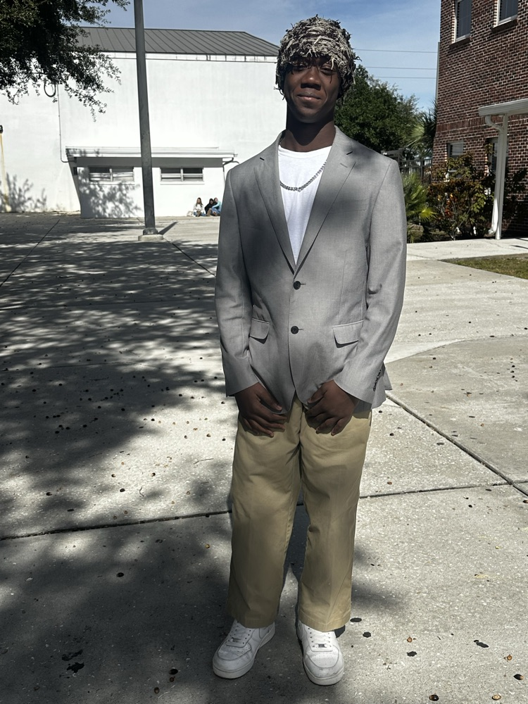 student dressed up in suit