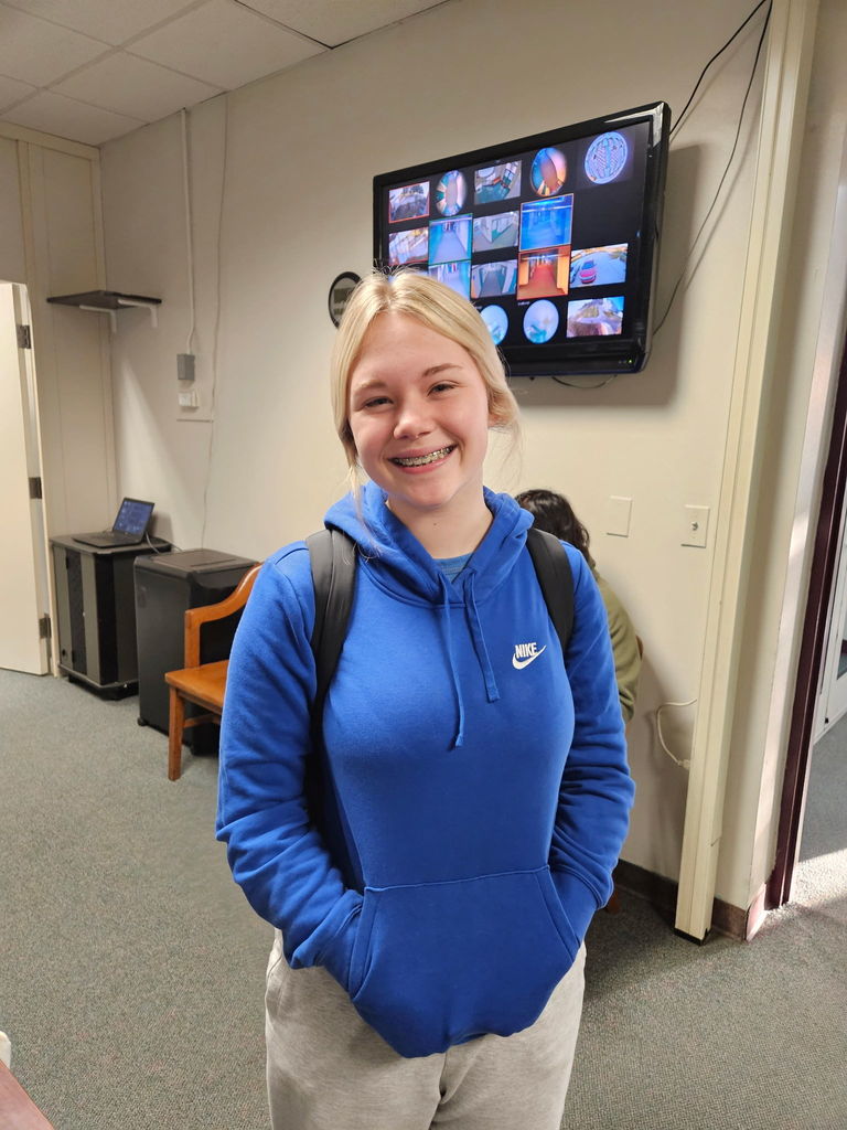 student in main office with braces