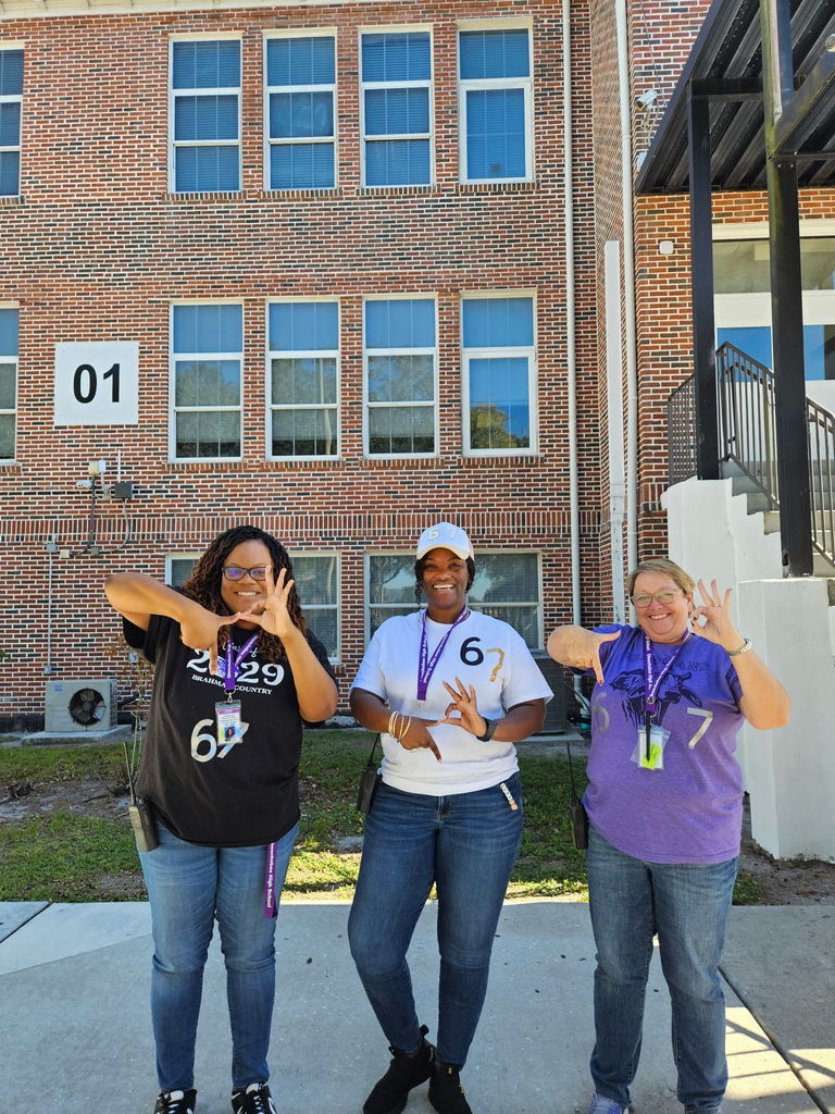 admin wearing 67 gear for 67th day of school