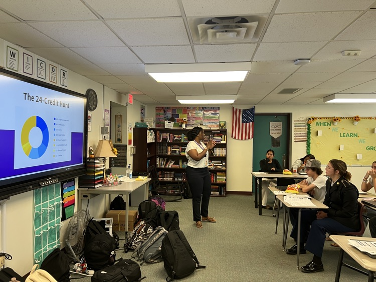 guidance counselor talking to English class 