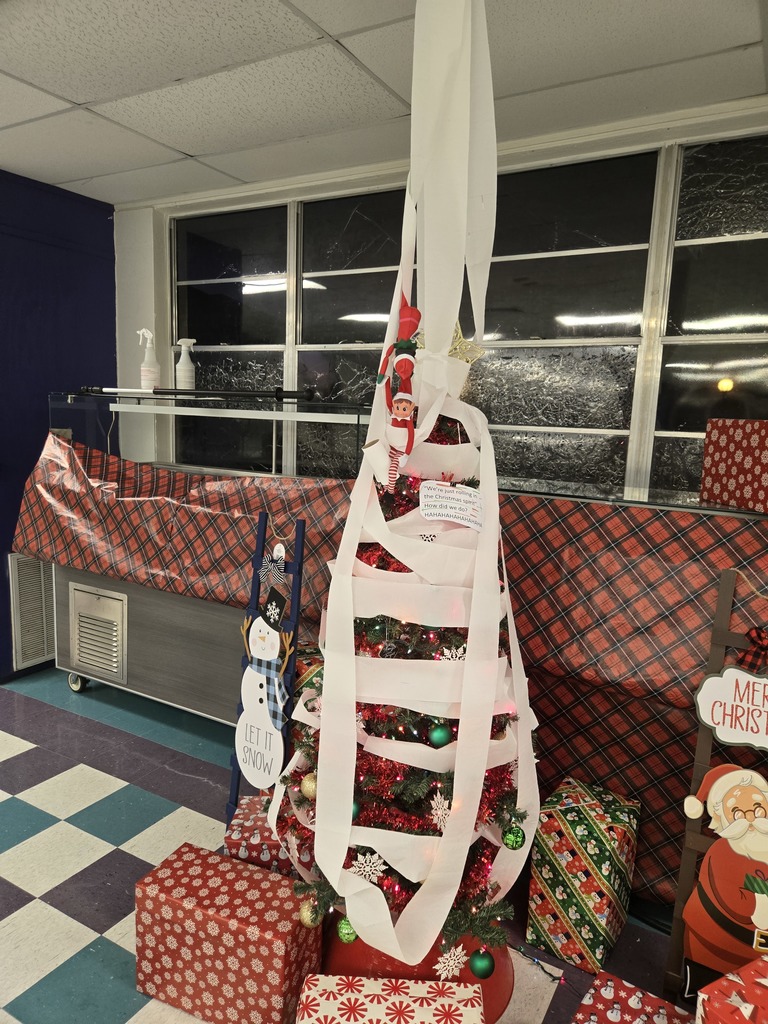 Christmas tree with toilet paper wrapped around it