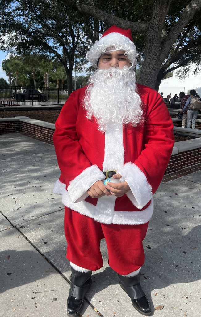 student wearing a Santa costume