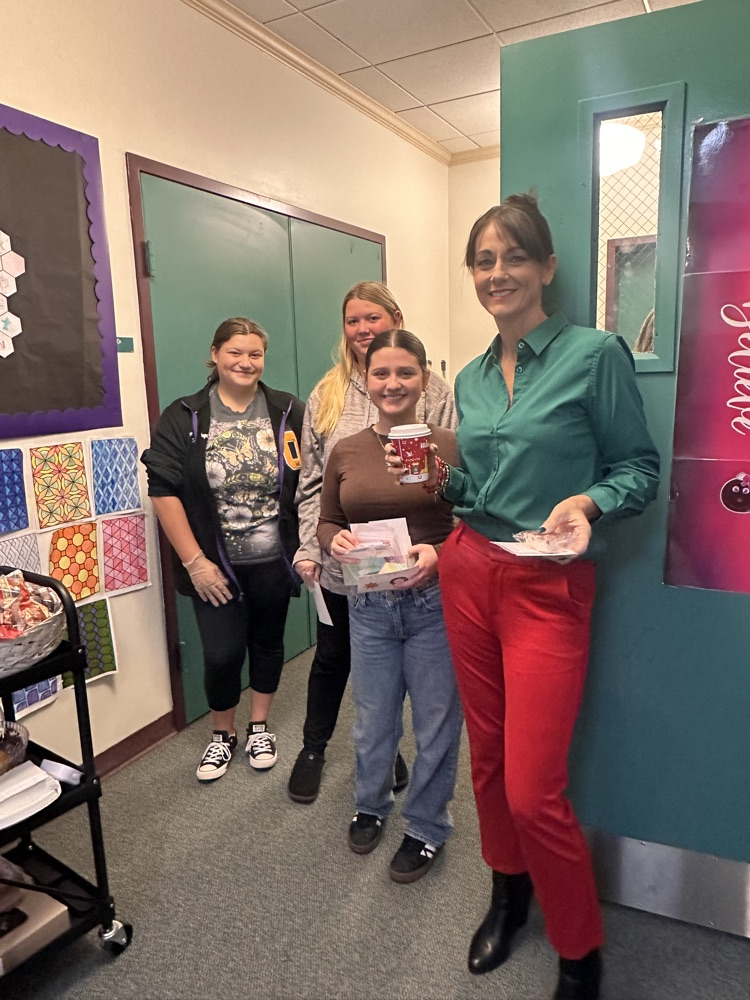 teacher getting breakfast delivered to class