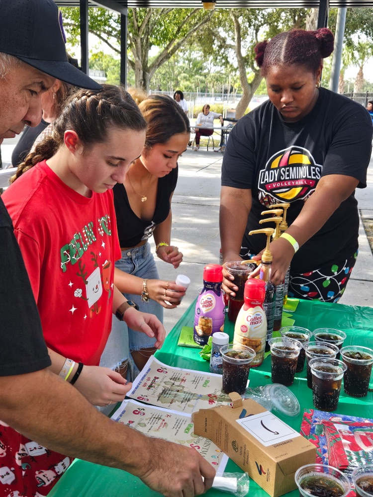 students serving sodas  