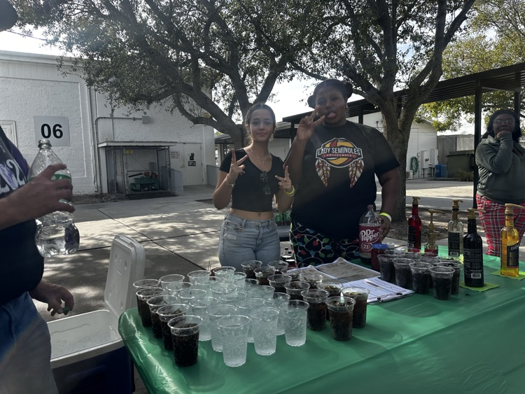 students serving sodas at school