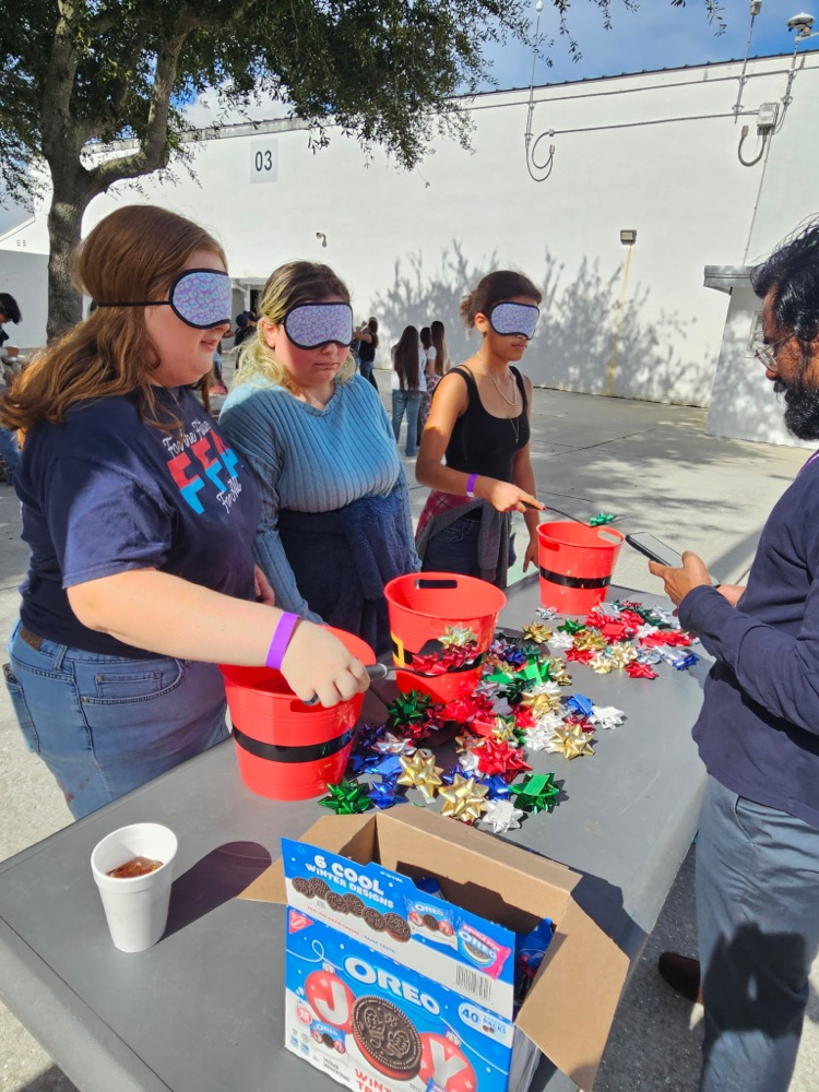students playing holiday school games 