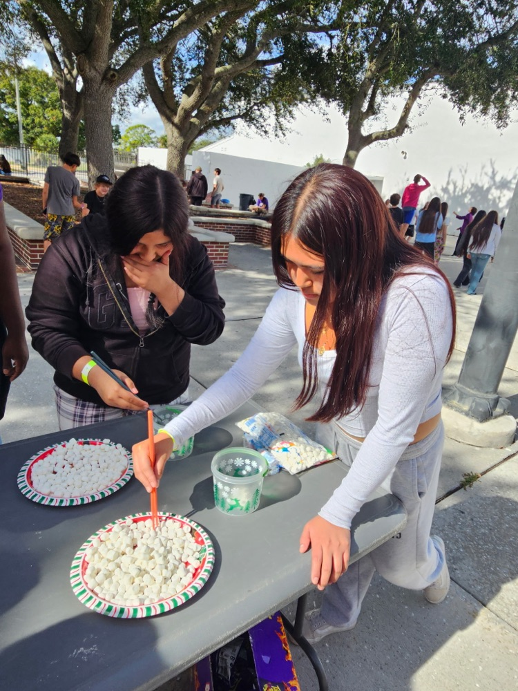students playing holiday school games 