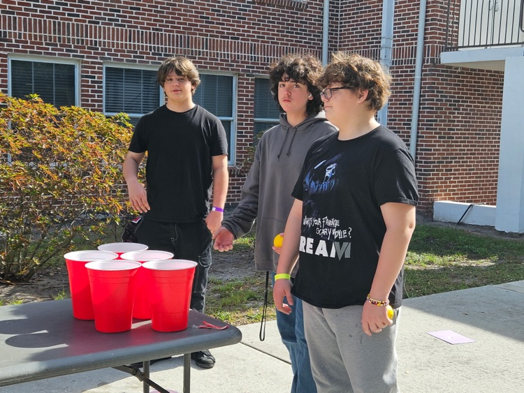students playing holiday school games 