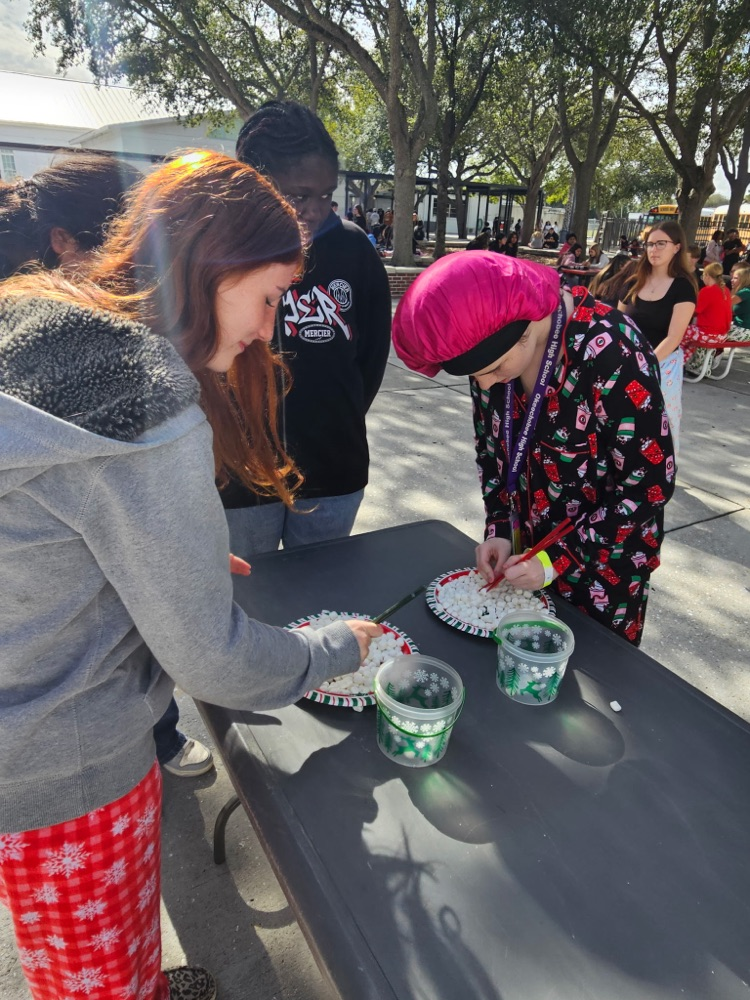 students playing games in courtyard