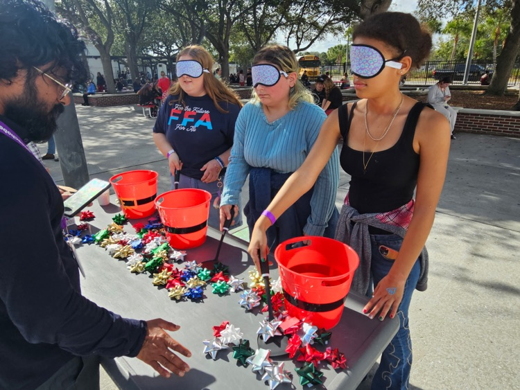 students playing games in courtyard