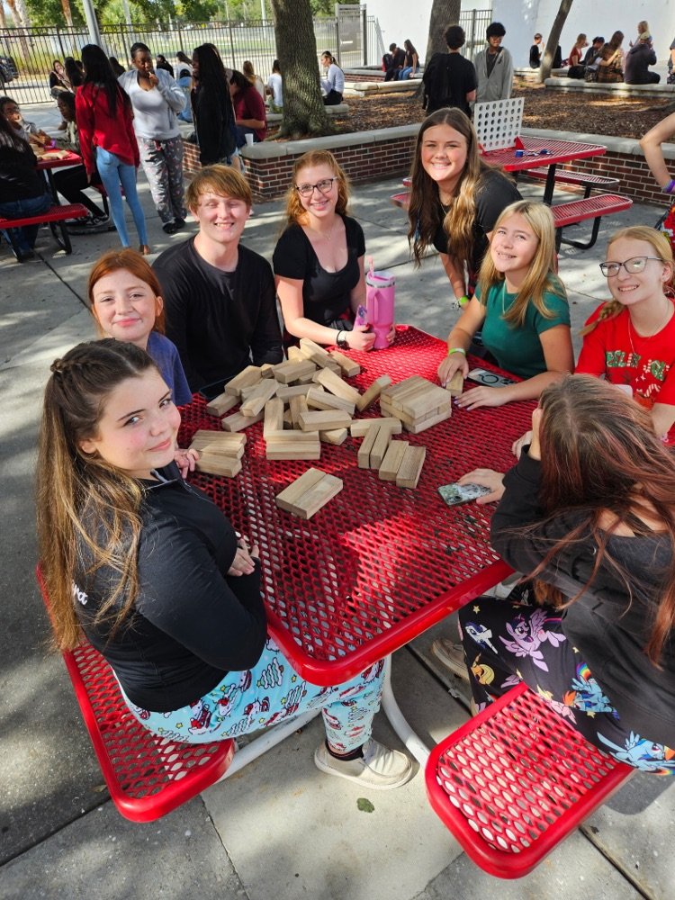 students playing games in courtyard
