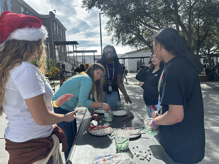 students playing games in courtyard