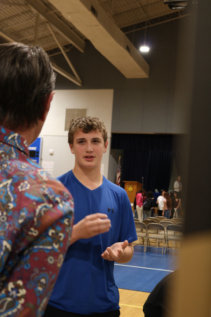 student presenting science fair