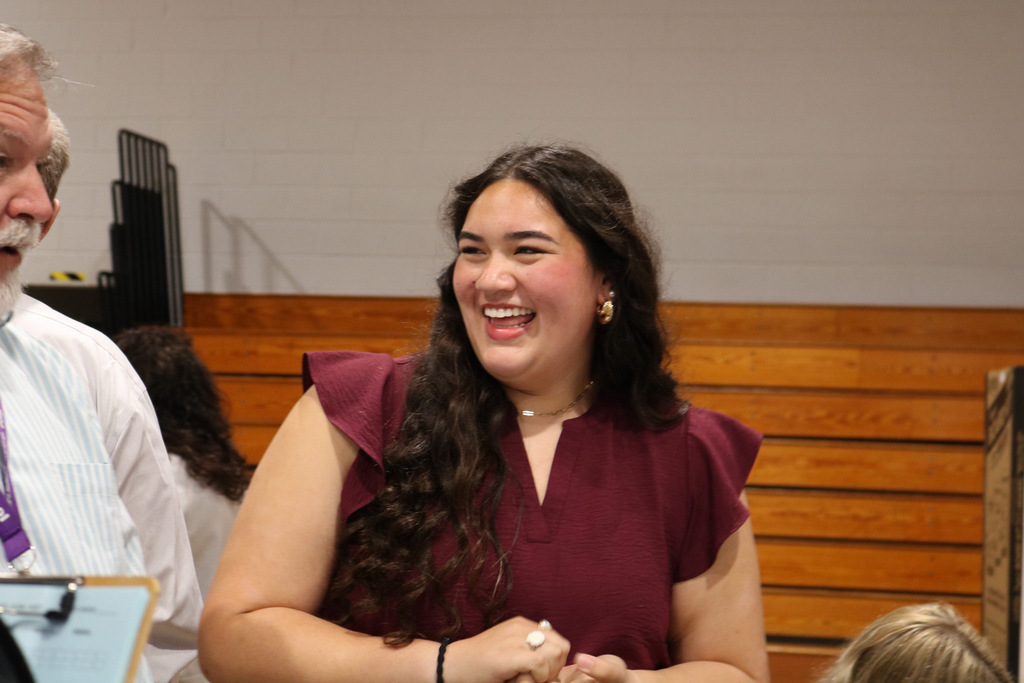 student smiling at science fair