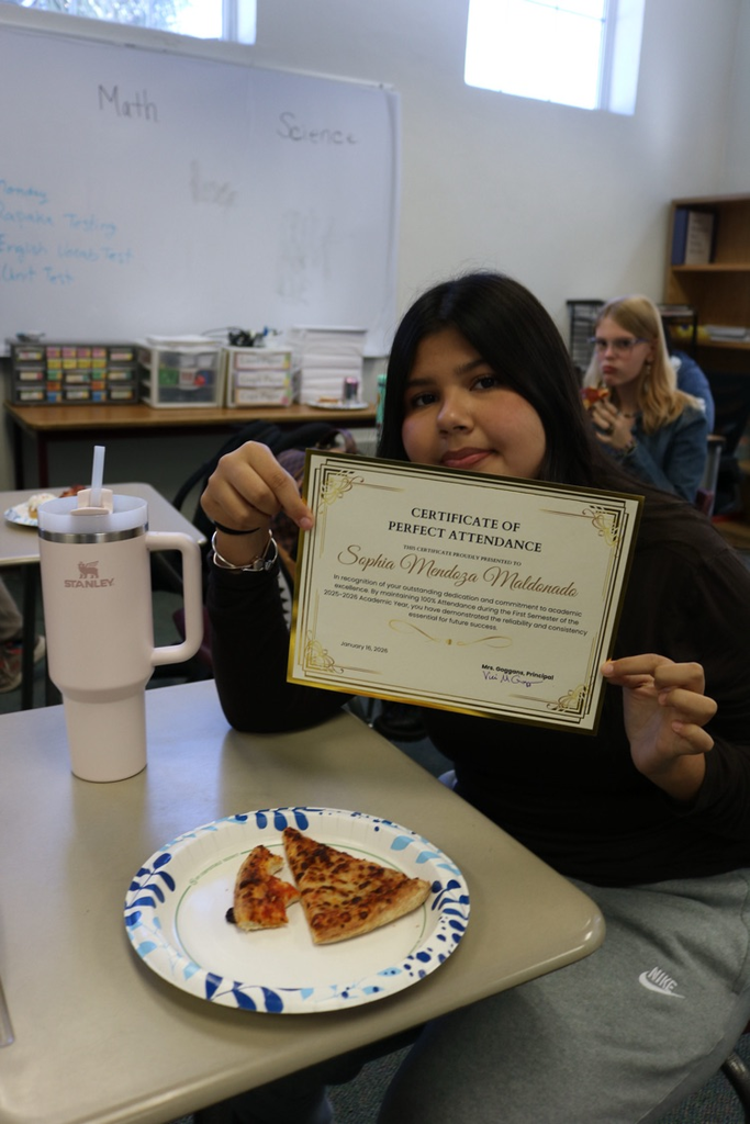 student showing certificate 