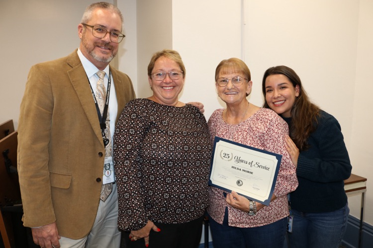 superintendent and three educators 