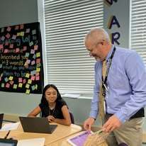 Superintendent with students
