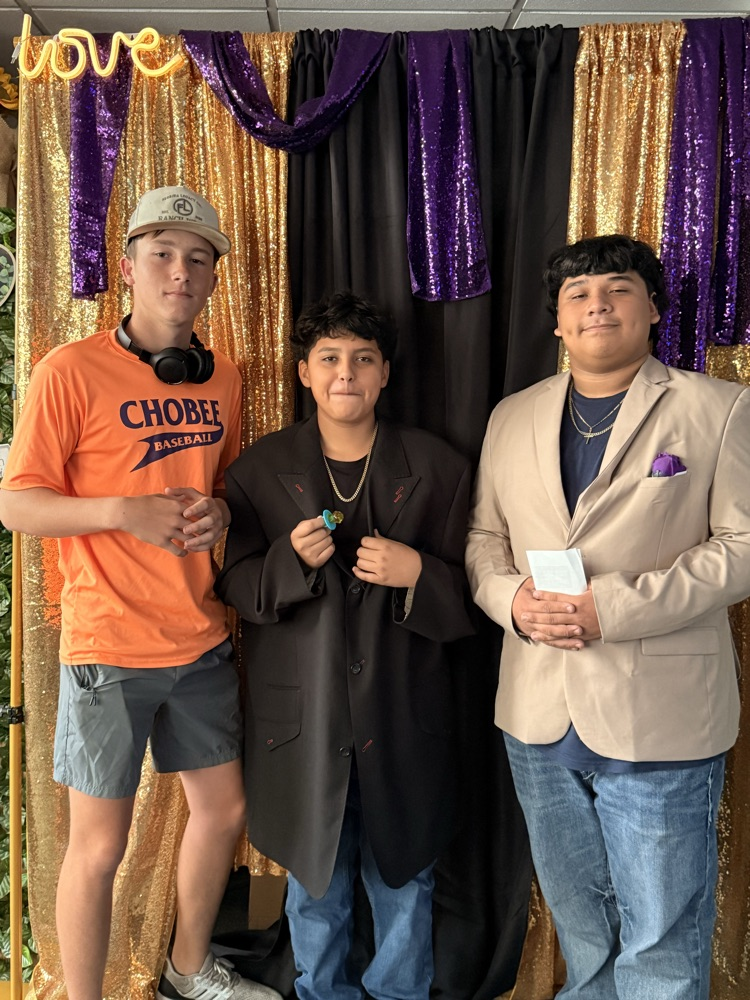 three male students in English class