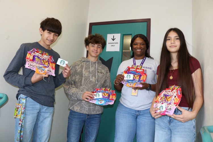 three students and guidance counselor