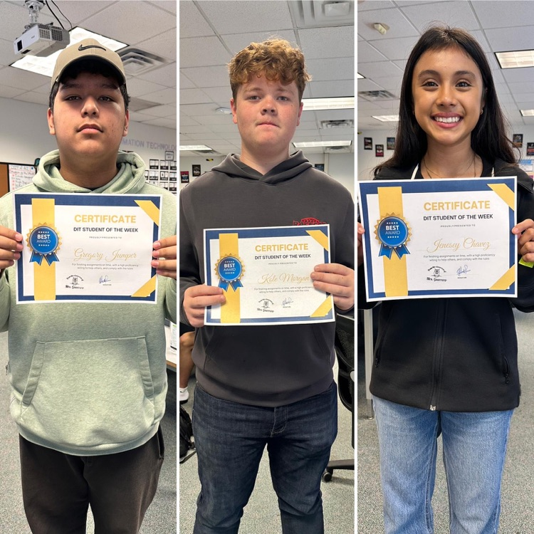three DIT students holding certificates 