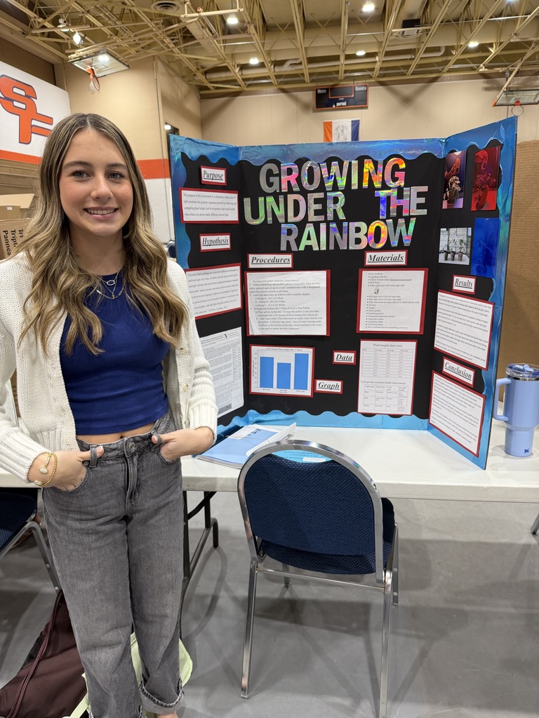 student participating in regional science fair