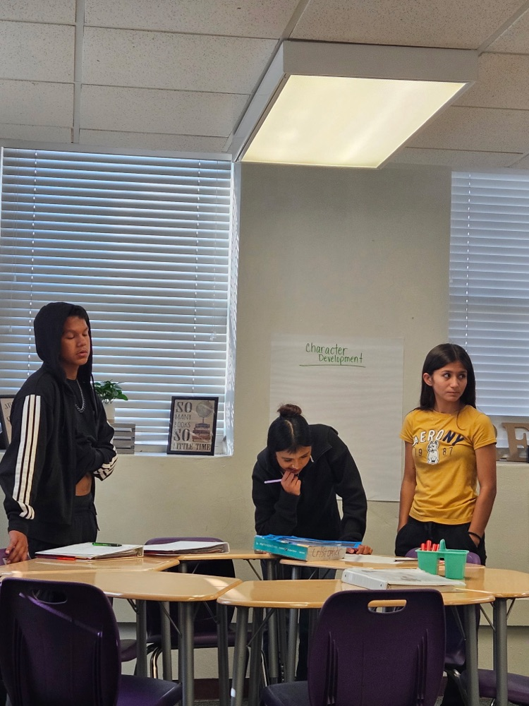 students diving into English text in Class