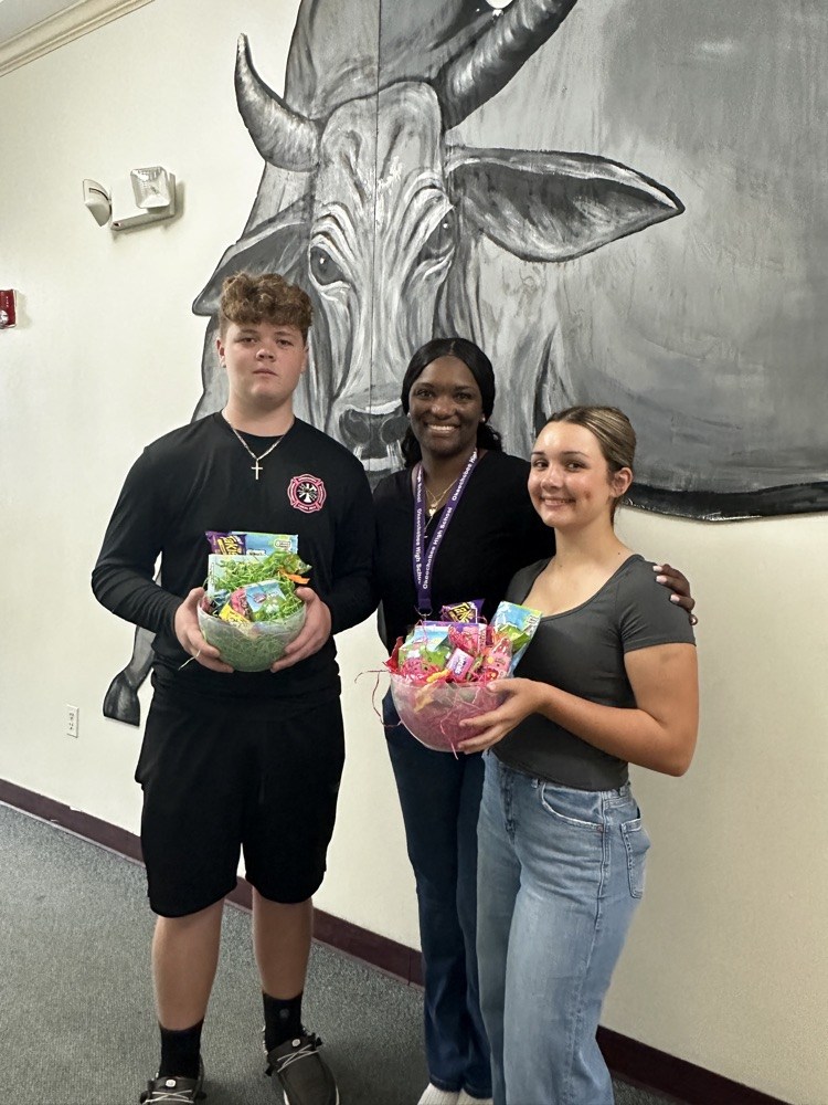 two students with guidance counselor 