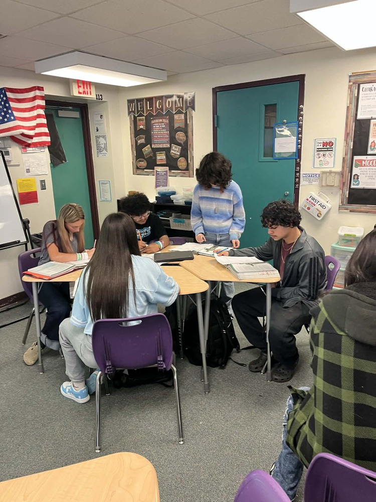 students working together in English class