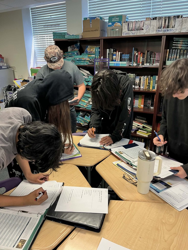 students working together in English class