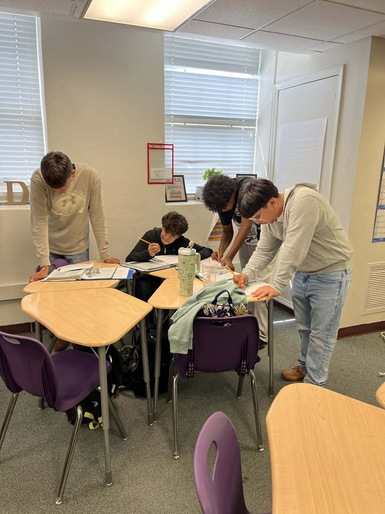 students working together in English class