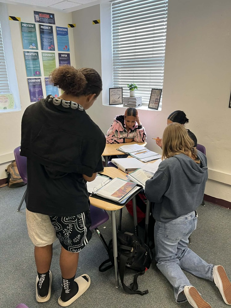 students working together in English class