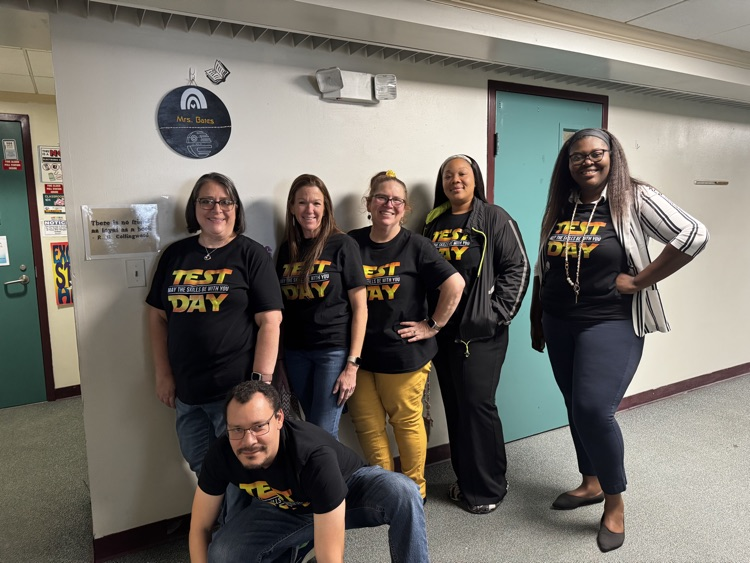 six teachers with matching shirts