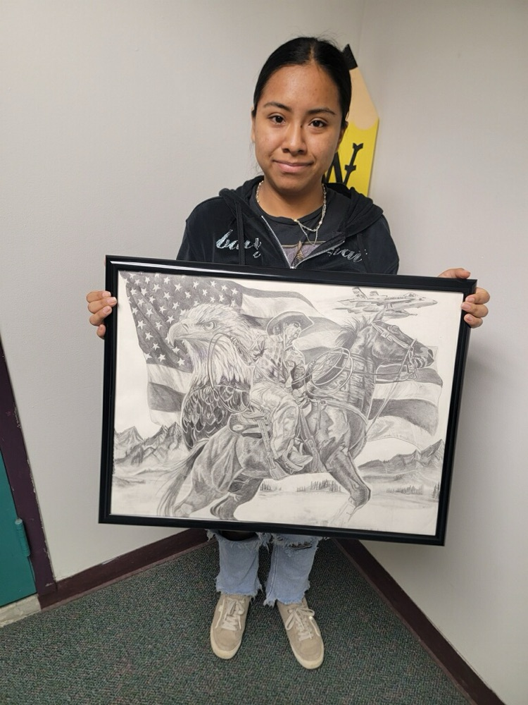student with art submission