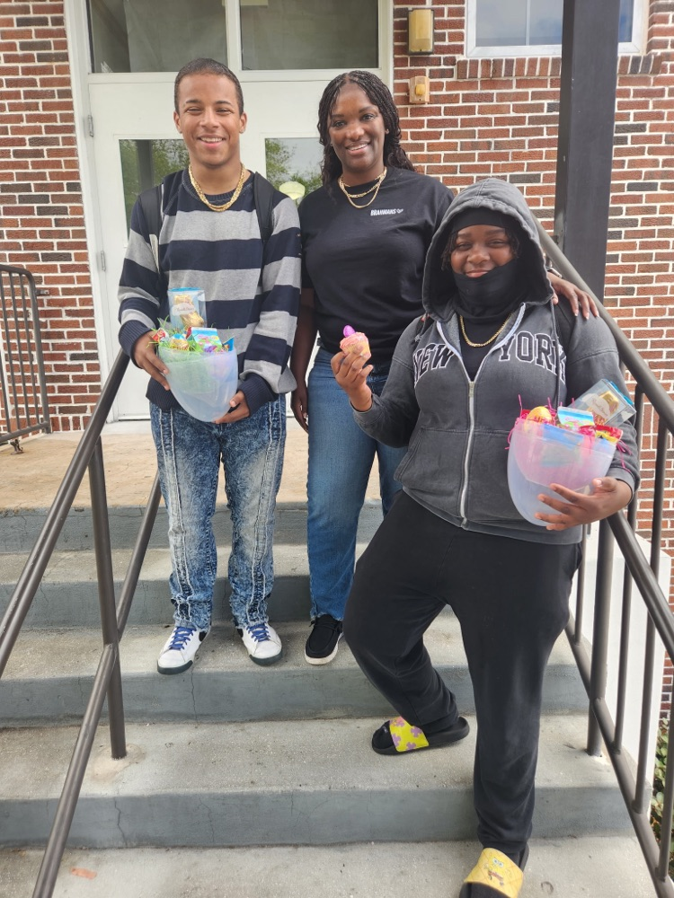 two students with guidance counselor