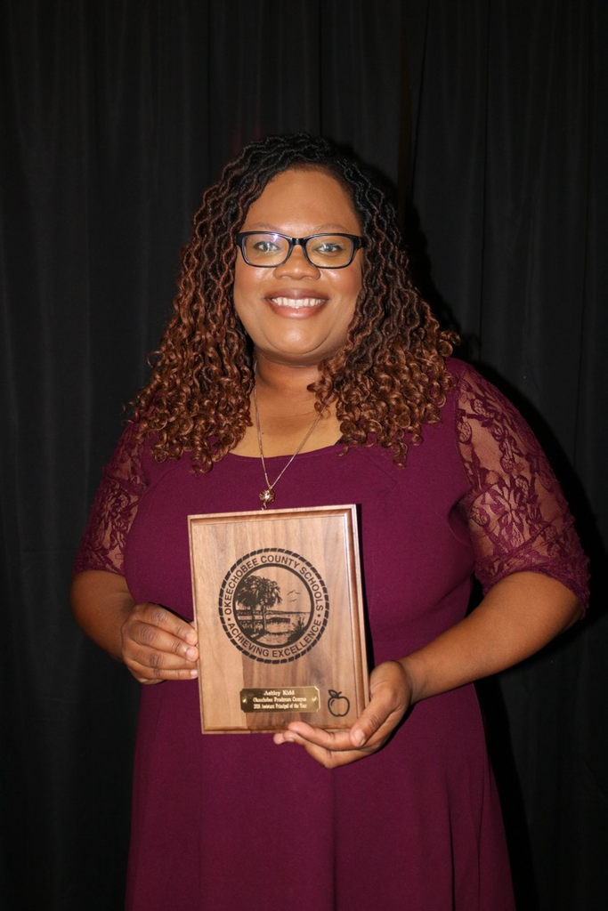 principal holding plaque