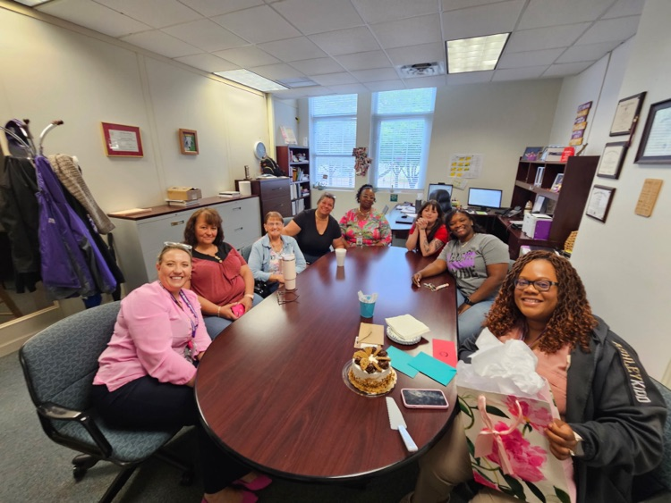 staff members in principals office