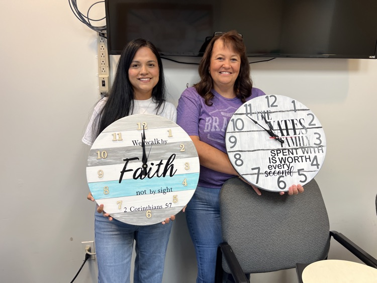 two staff members with craft 