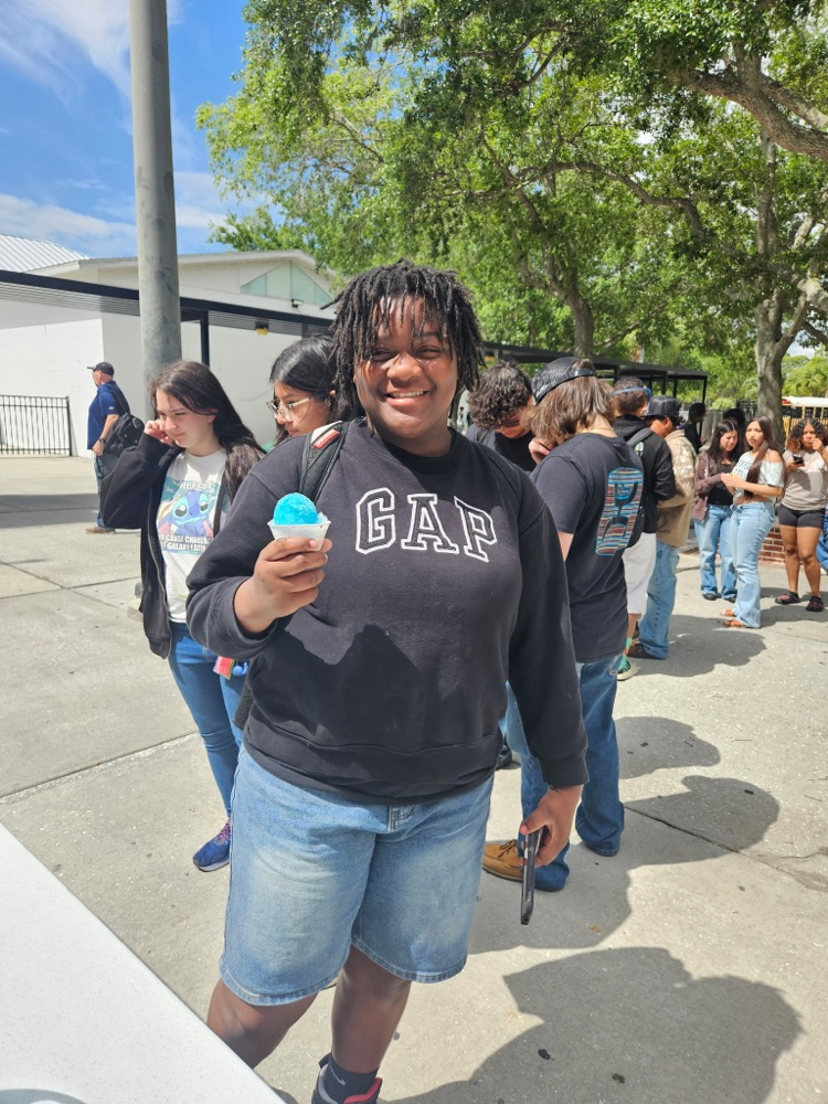 student with snowcones