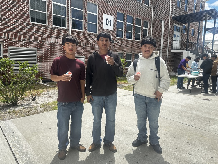 three students with snowcones 