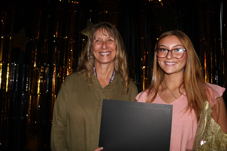teacher and student at banquet