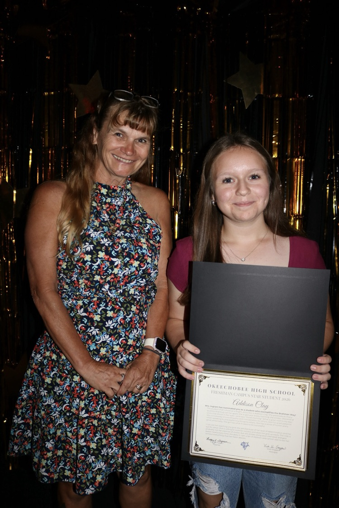 teacher and student at banquet