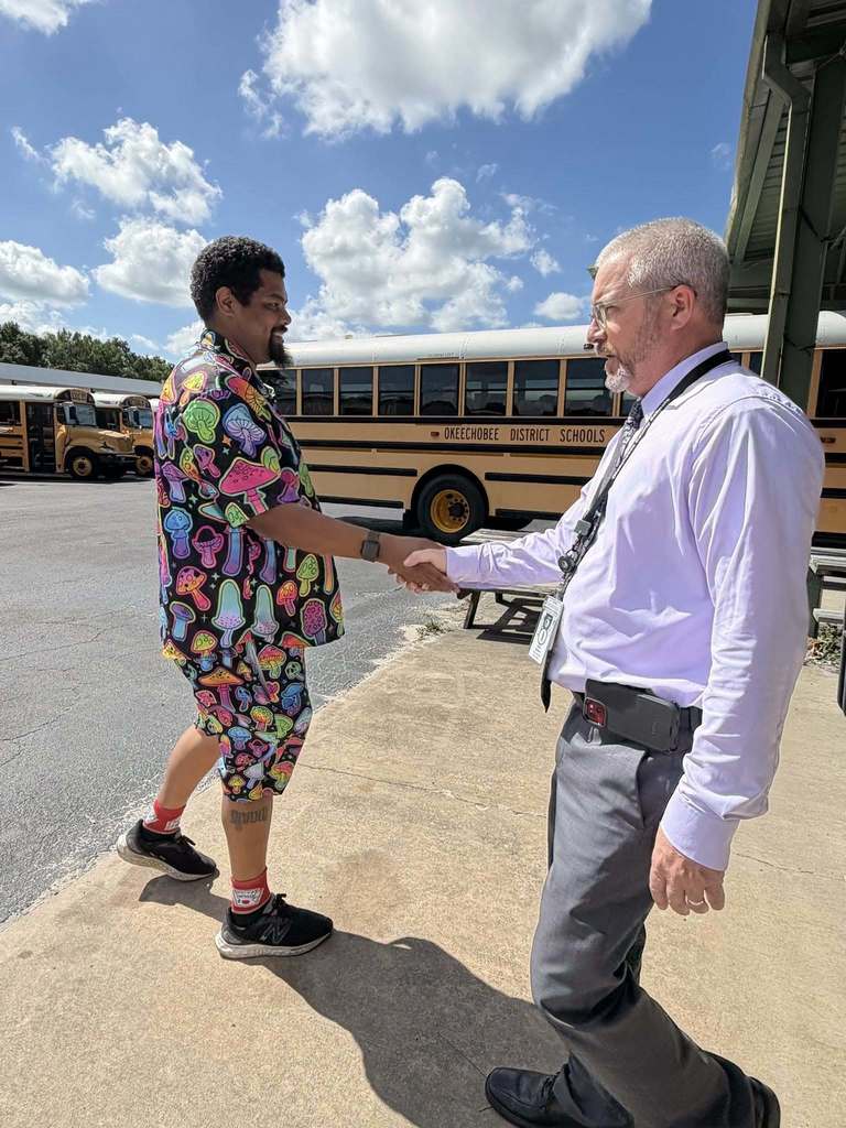 Staff shaking hands