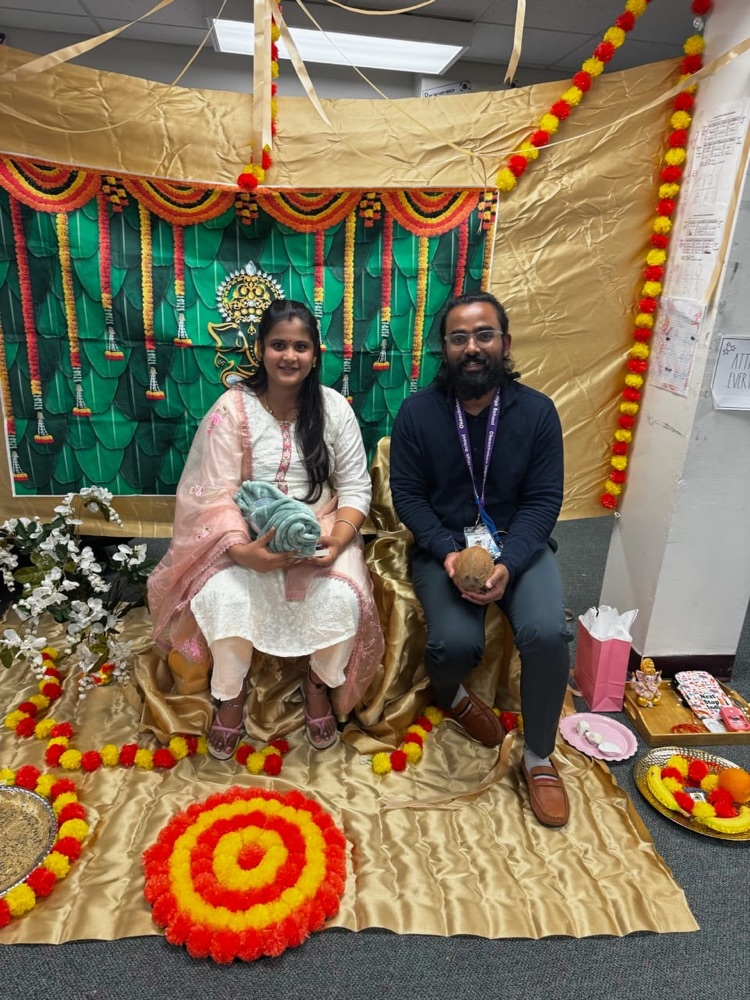 two people dressed for Indian babyshower