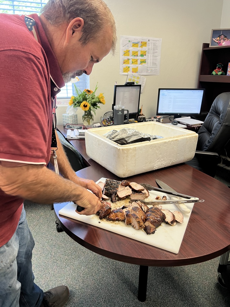 teacher cutting food 