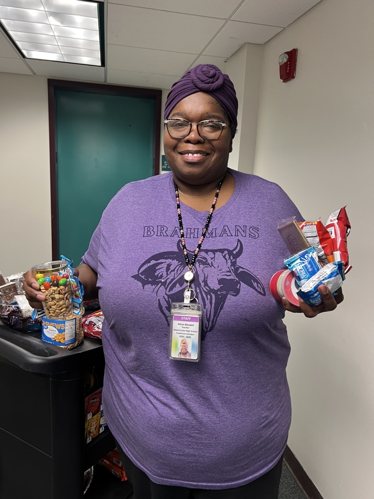 teacher grabbing snacks from cart