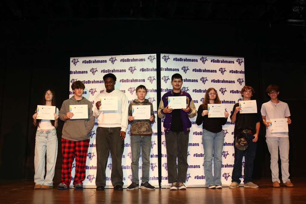 students with certications on stage