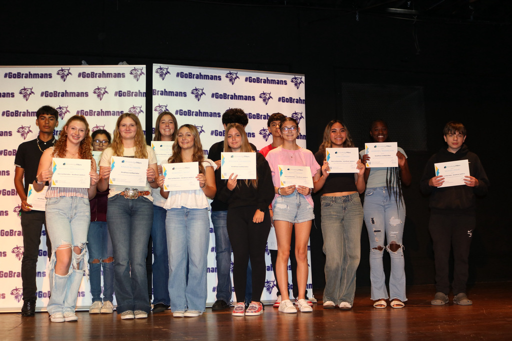 students with certications on stage