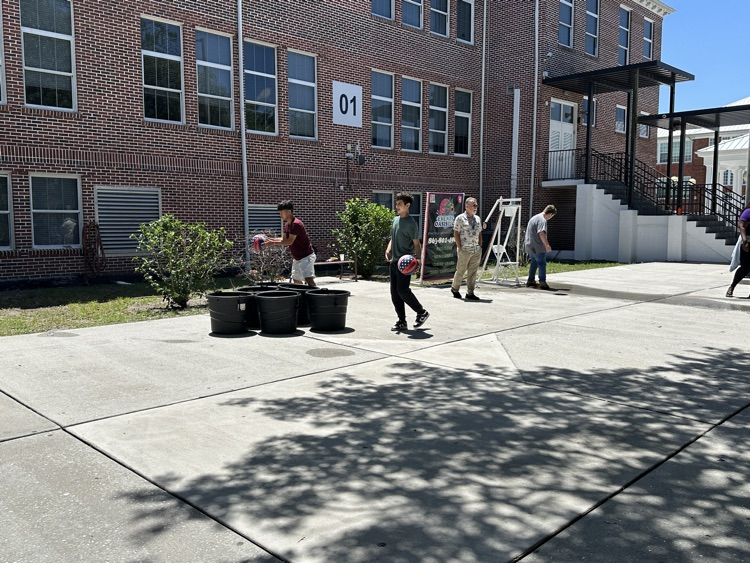 students playing games in school courtyard